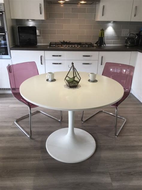 Ikea dining tables come with different sizes and heights. Ikea Docksta white dining table with 2 Ikea Tobias purple ...