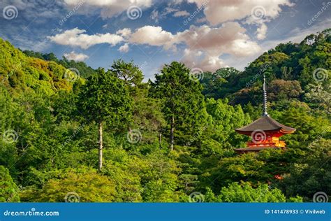 Red Pagoda On A Green Hill Surrounded By Trees In Kiyomizudera Temple