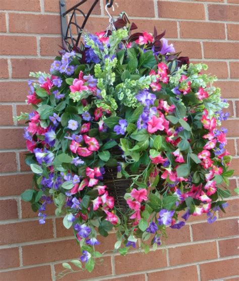 Put a spring in your step with these faux flowers that give a fresh bouquet of. Hanging Baskets With Artificial pink petunias G-25 ...