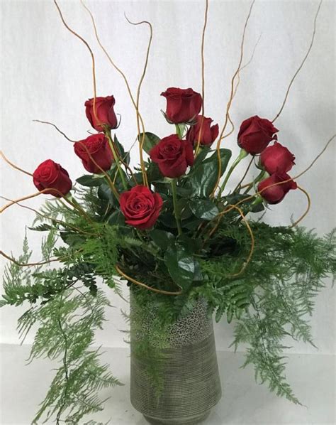 12 Roses In Decorative Container Lilygrass