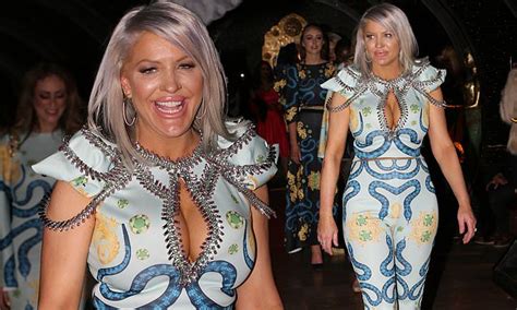 brynne edelsten 36 slips into very busty jumpsuit for melbourne spring fashion week