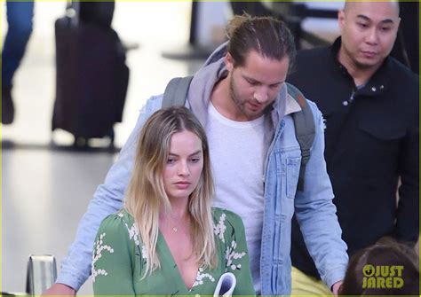 Margot Robbie And Tom Ackerley Arrive In New York City