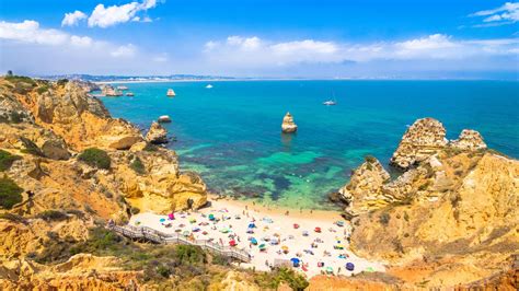Beautiful sunset beautiful beaches beach sunset pictures. Camilo Beach Beaches In Southern Portugal Near The Lively Seaside Town Of Lagos In The Western ...