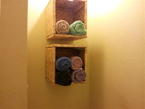 Hide your things in plain sight with storage boxes. Towel storage. Got the baskets from IKEA & idea from ...