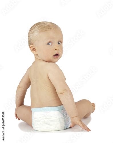 Baby Sitting Turned Around On White Background Stock Photo And