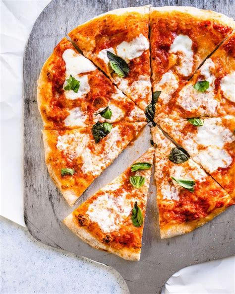 Remove from the oven and top with fresh basil leaves and a pinch of red pepper flakes. Homemade Margherita Pizza (Secrets for perfect dough ...