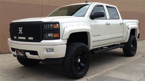 4 lift wit new 33 m/t nitto tires!!!, fresh oil change, led light bar, led lights, tonnau cover, custom exhaust, no rust, no warning dashboard lights, needs nothing for safety, drivers very good. Lifted 2014 Chevrolet Silverado 1500 LTZ by RTXC in ...