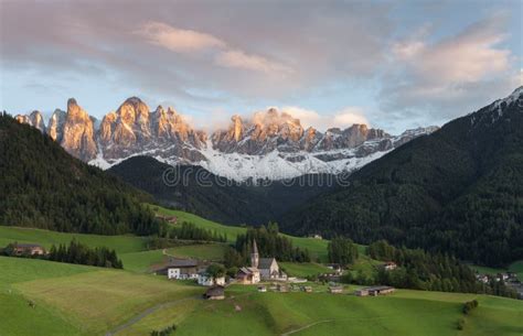 Small Italian Mountain Town Of St Magdalena In Val Di Funes At Sunset