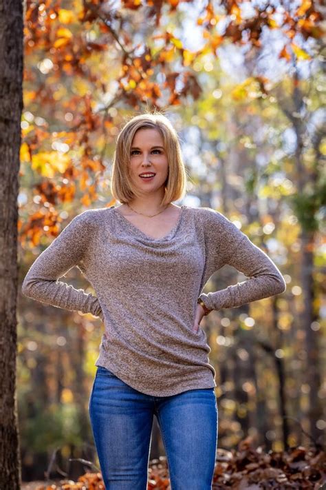 A Lovely Blonde Model Poses Outdoor While Enjoying The Fall Weather Stock Image Image Of