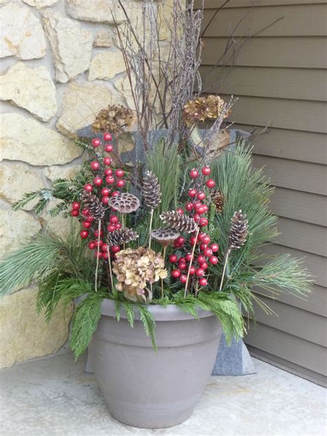 Outdoor Christmas Décor Using Evergreens Hydrangea Pinecones Pods