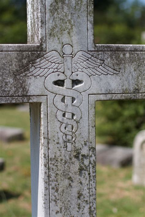 Neil cross's 'burial' explores this stark predicament. Free Images : symbol, cross, cemetery, grave, memorial ...