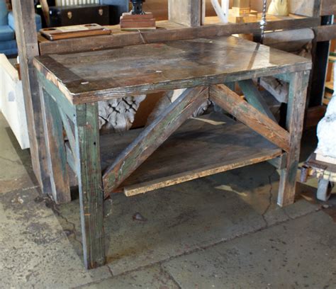 Designing countertops with sinks is common at grothouse; Small Industrial Wood Work Table - Salvage One