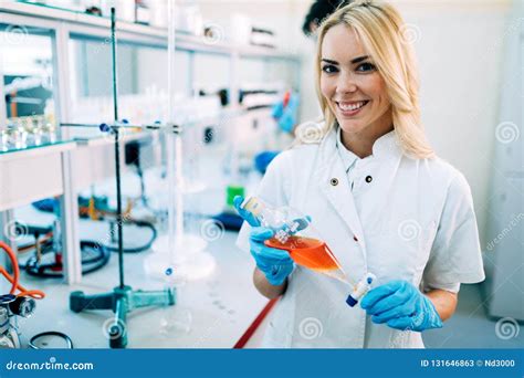 Attractive Student Of Chemistry Working In Laboratory Stock Image