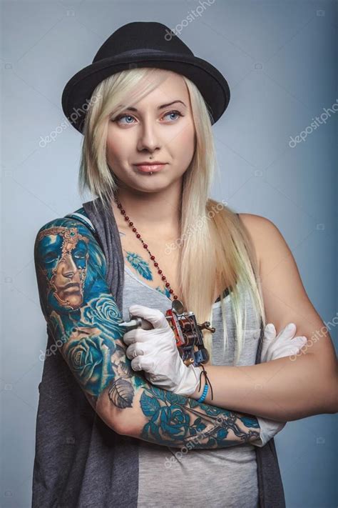 Beautiful Girl Tattoo Artist With Tattoos Stock Photo By ©mikhailkayl