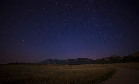 Green Grass Field Near Mountain At Night Time Photo Photo Free