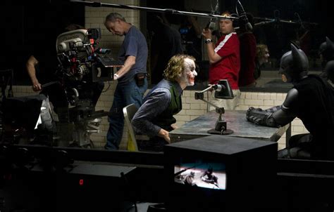 Batman Christian Bale And The Joker Heath Ledger Face Off In The