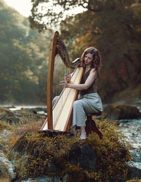 Girl Playing Harp At Cenarth Falls In West Wales Harp Celtic Harp