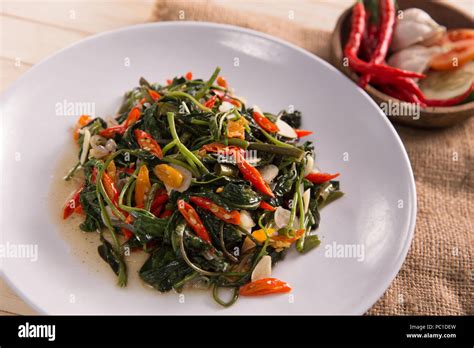 Stir Fried Water Spinach Or Cah Kangkung Stock Photo Alamy
