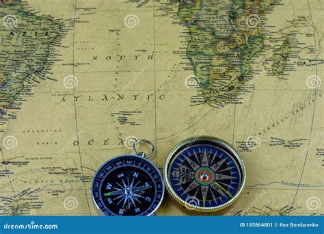 Compasses On Old Map Of The World Journey And Discovery Concept Stock