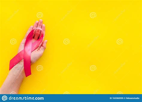 The ribbon emoji appeared in 2010, and also known as the pink ribbon emoji. Pink Ribbon In Hands As Symbol Of Breast Cancer Awareness ...
