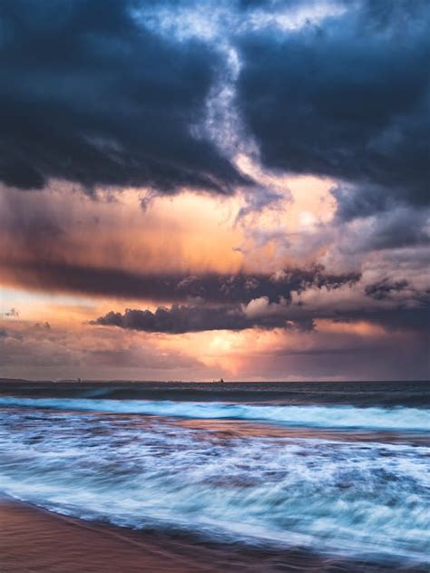 Ocean Waves Under Cloudy Sky · Free Stock Photo