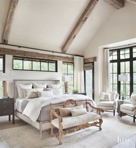 The room is flooded with natural light, and the change of color on the patio wall creates just enough contrast to balance out the bright colors. Beam Master Bedroom with High Windows, Bench Loveseat and ...