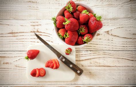 Slicing Strawberries Photograph By Larry Hanna Fine Art America