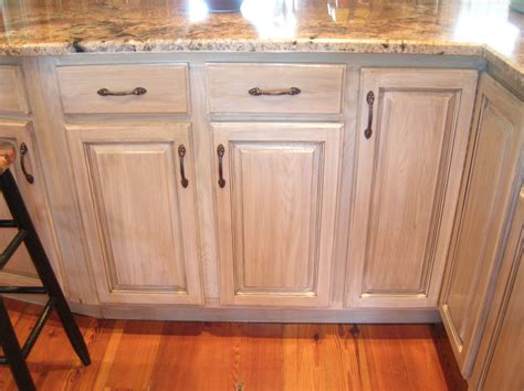 Then, using a fresh rag, wipe with the grain to remove the excess and expose the grain. Pickled Oak Cabinets | before after oak armoire before oak armoire ... | Oak kitchen cabinets ...