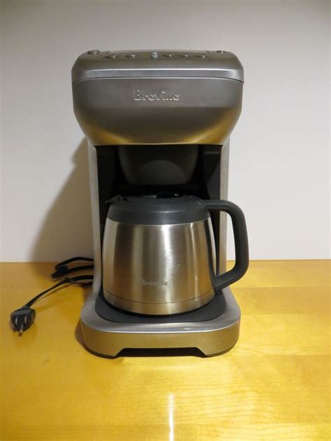 Coffee single cup grind and brew coffee maker scores in the aesthetics division with the front showcasing the smooth stainless surface. Breville BDC600XL The You Brew Coffee Maker Brewer 12 Cup ...