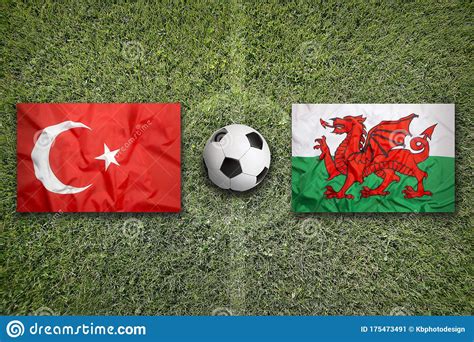 Der streamingdienst aus ismaning hat übrigens keine rechte an der liveübertragung der spiele der. Turkey Vs. Wales Flags On Soccer Field Stock Image - Image ...