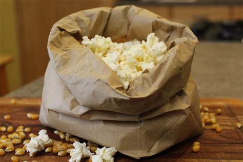 Popping Popcorn In A Brown Paper Bag Fun Popcorn Recipes