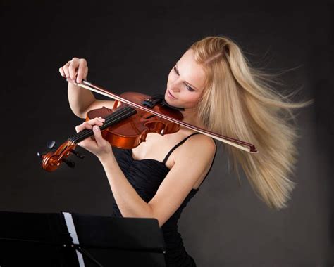 Andrey Popov » Young woman passionately playing violin