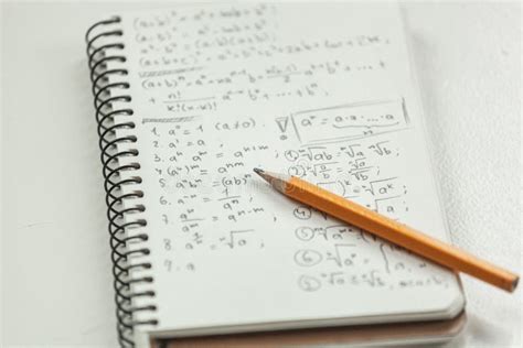 Math Formulas Are Written In Pencil On A Piece Of Paper Math Problems