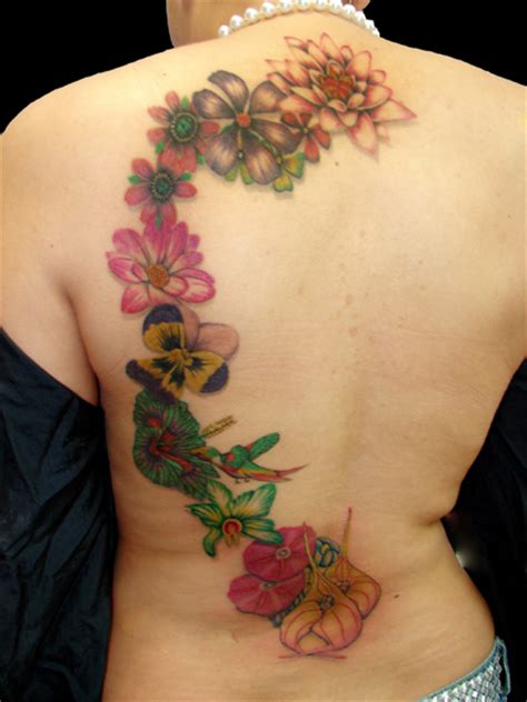 Small tribal hummingbird tattoo idea on the forearm. Floral Tattoos Designs, Ideas and Meaning | Tattoos For You