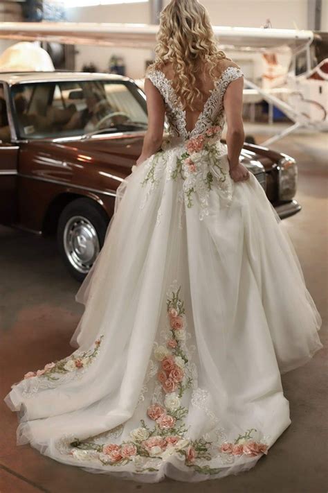Check out our designer wedding dress selection for the very best in unique or custom, handmade pieces from our dresses shops. Wedding dress Rose Collection from Inga Ezergale design ...