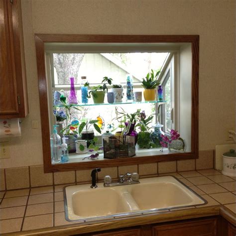 Instructables has a free greenhouse plan that uses a unique building material—old windows. Amazing Ideas About Greenhouse Windows Kitchen | Diy ...