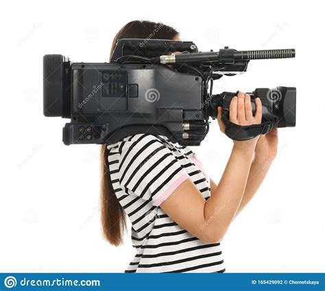 Operator With Professional Video Camera On White Background Stock Photo