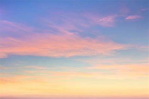 Pastel Colors Of Sundown Sunset Sky With Beautiful Light Clouds Stock