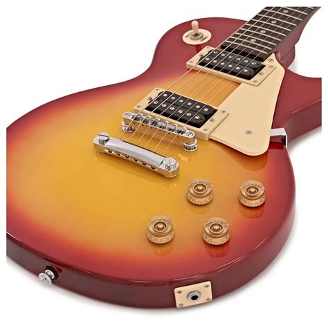 This epiphone les paul 100 sports a mahogany body with a maple top, a okoume neck, a rosewood fingerboard, and two humbucking pickups. Epiphone Les Paul 100 Electric Guitar, Heritage Cherry ...
