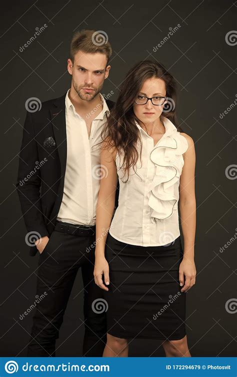 confident of success business partners with confident look confident couple in formalwear