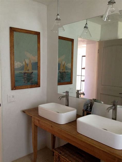 The most common mid century modern bathroom vanity material is metal. Mid Century Modern Vanity Upgrades Every Bathroom with Perfect Vintage Look - HomesFeed