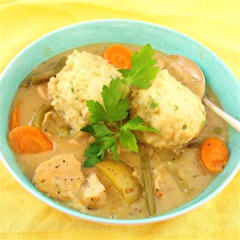 This simple chicken stew with dumplings is the perfect family dinner recipe that is easy to make & topped with tender suet dumplings. Chicken Stew with Parsley Dumplings