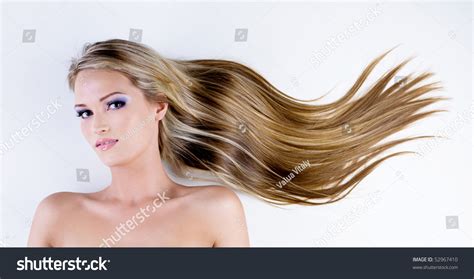 Beautiful Woman With Long Straight Hair Lying Down Stock Photo