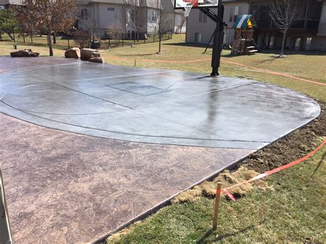 Surrounding the entire basketball court there is a thick line. Basketball Courts | E & J Concrete and Dirt Work
