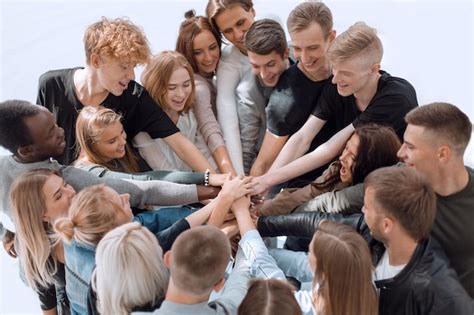 Premium Photo Group Of Diverse People Joining Their Hands In A Circle