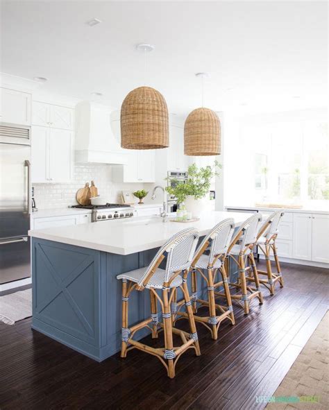 Coastal Kitchen With White Cabinets Blue Island Basket Pendant Lights