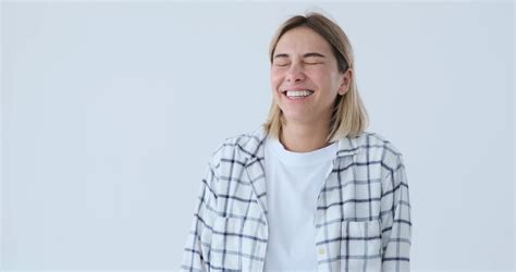 excited woman laughing over white background stock footage sbv 338542131 storyblocks