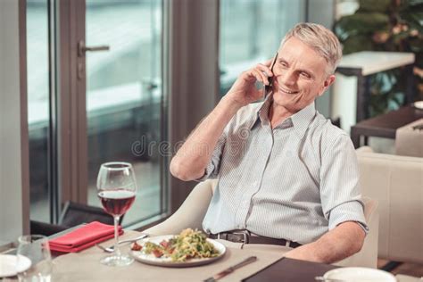Smiling Retired Man Relaxing In A Restaurant Stock Image Image Of