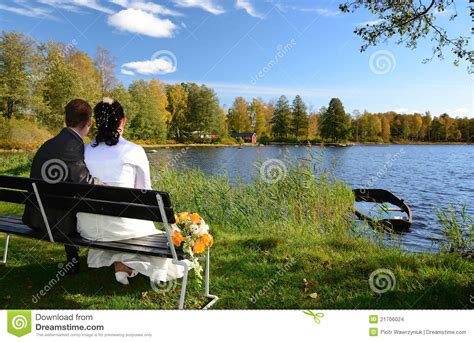 Newlyweds On A Lake Bench Stock Photo Image Of Grass 21706024