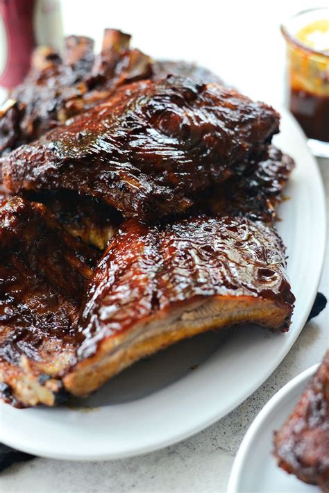 This traditional way of smoking ribs tastes like it came straight from the local bbq joint. Easy BBQ Baby Back Ribs - Simply Scratch